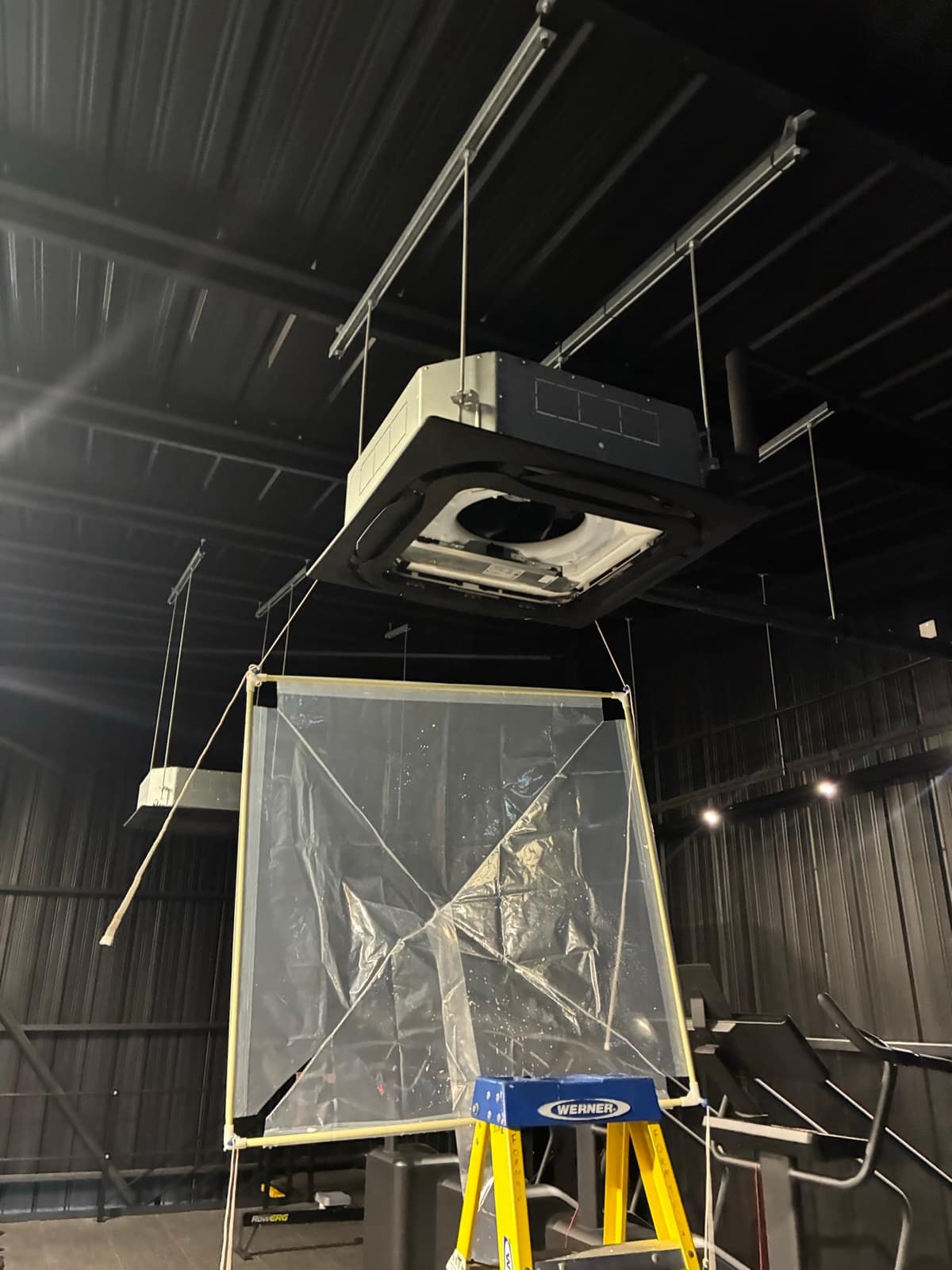 Ceiling cassette air conditioning unit in a commercial gym