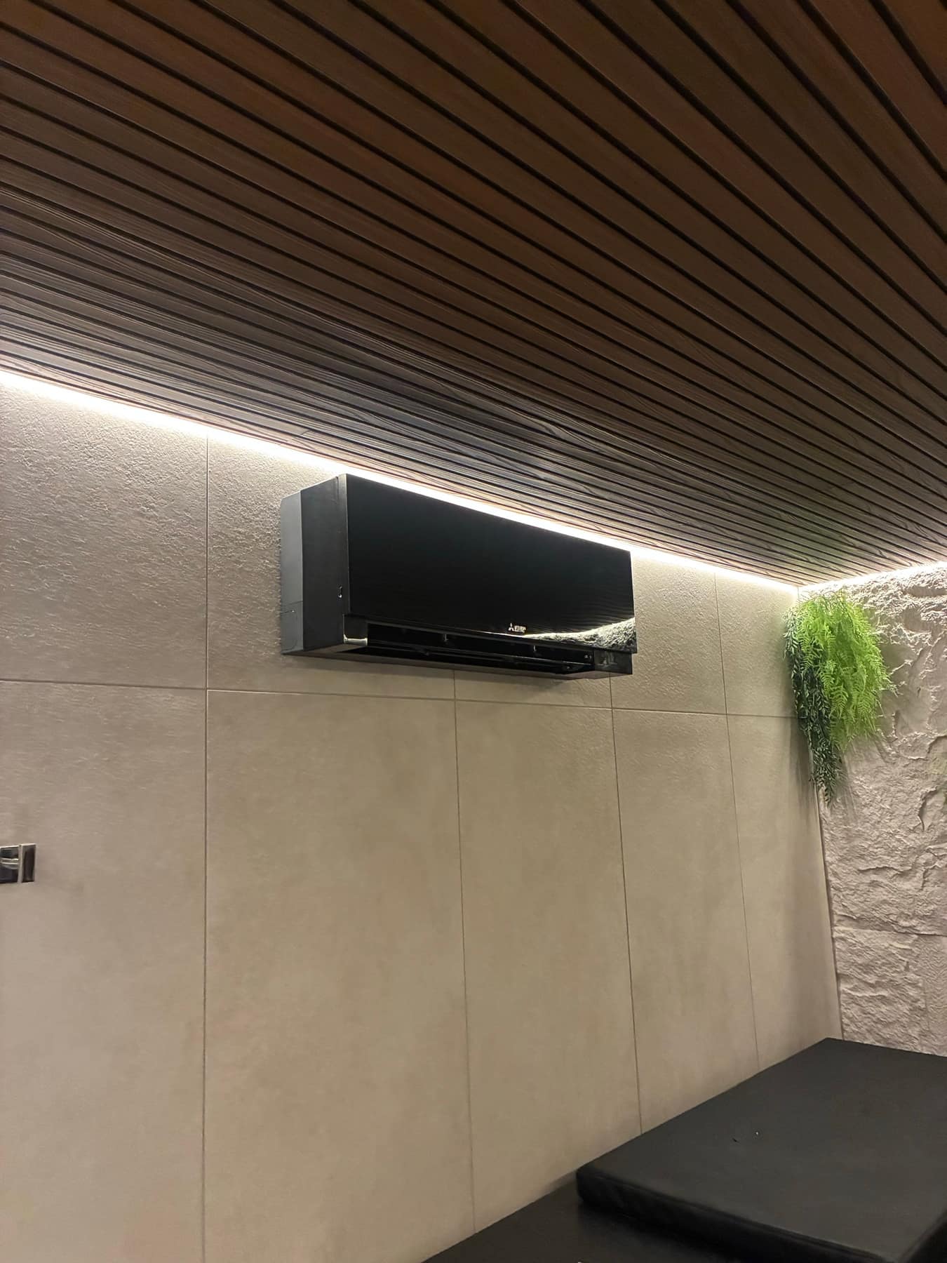 Wall-mounted air conditioning unit installed in a Torbay home